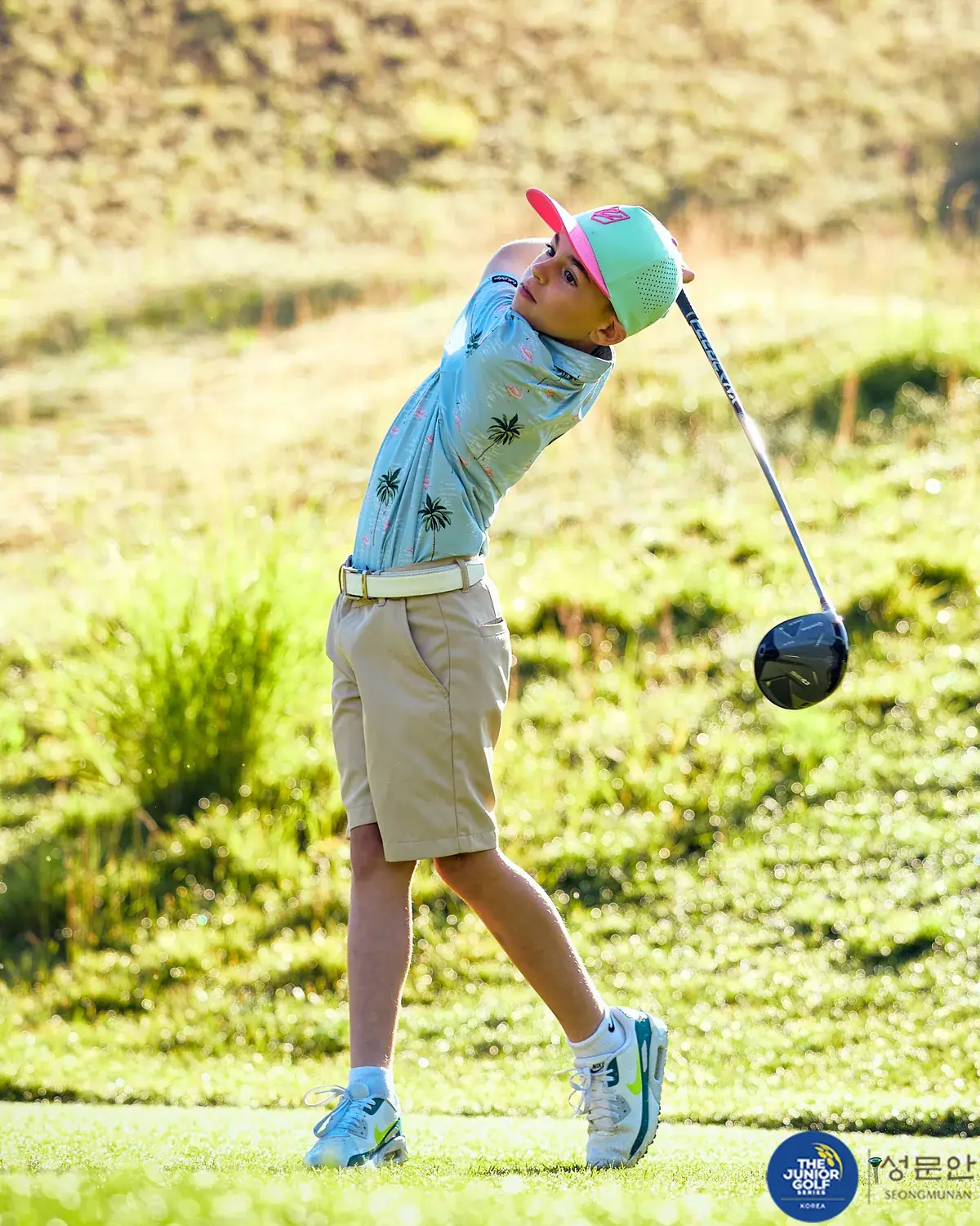 Junior golfer working on swing technique